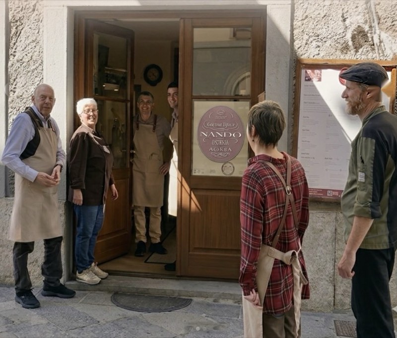 The Osteria da Nando staff at the entrance of the restaurant